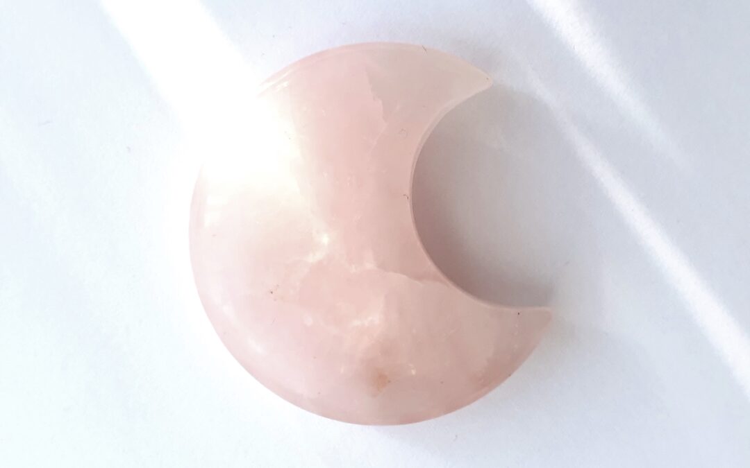 Rose quartz crystal for connecting to your intuition at the new moon in Pisces